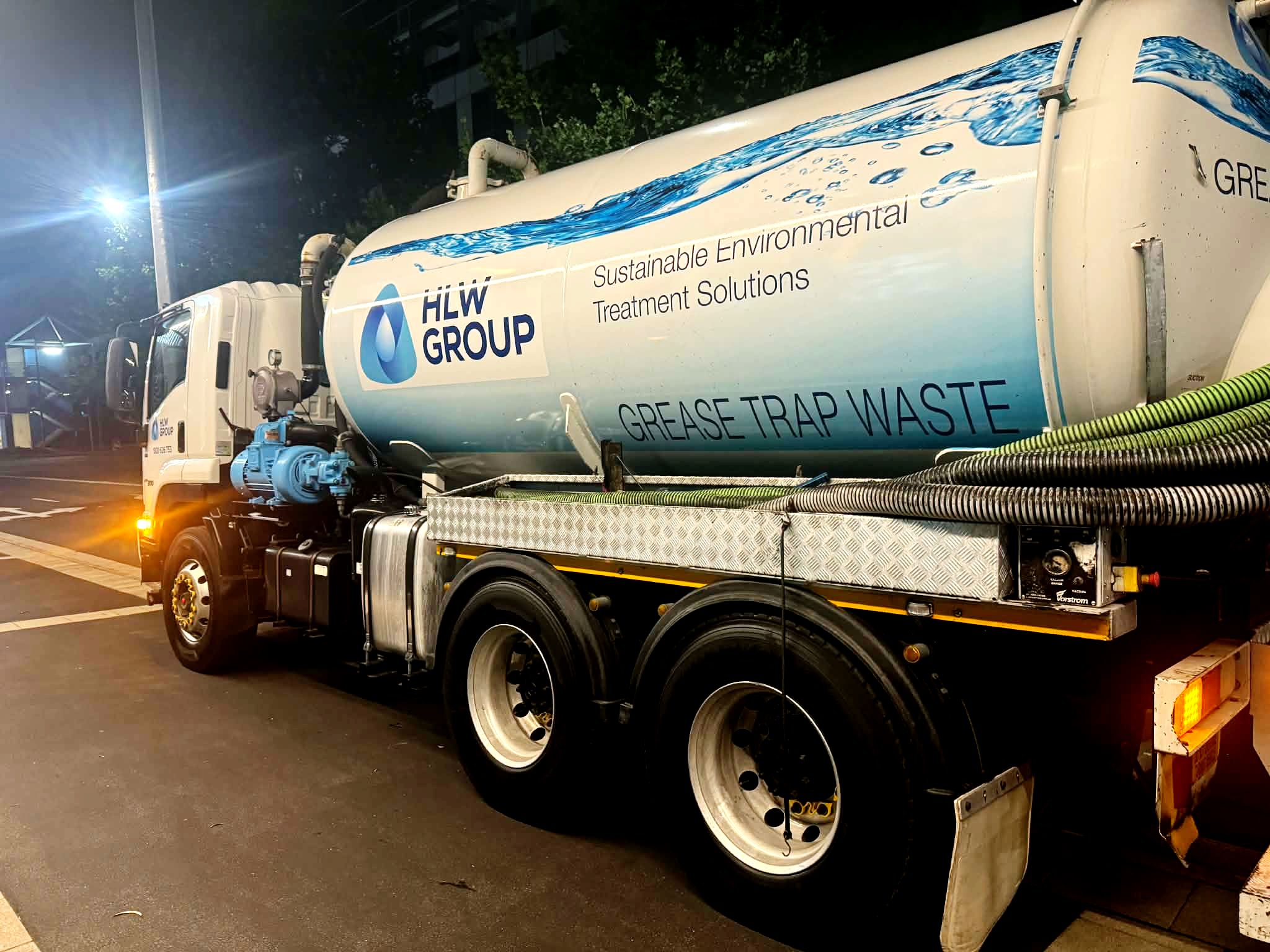 Commercial grease trap collection truck operated by HLW Group